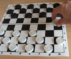 Сеанс одночасної гри в шашки